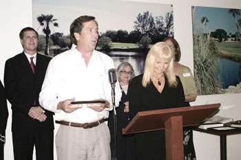 Chiles Group owner Ed Chiles accepts the large business of the year award.