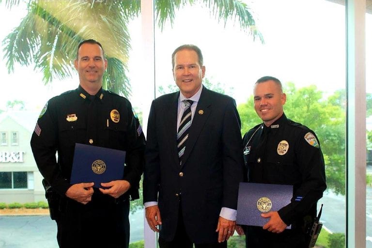 Two Holmes Beach police officers honored