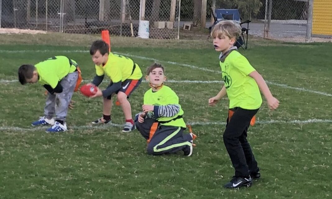 Youth flag football teens battle for first AMI Sun