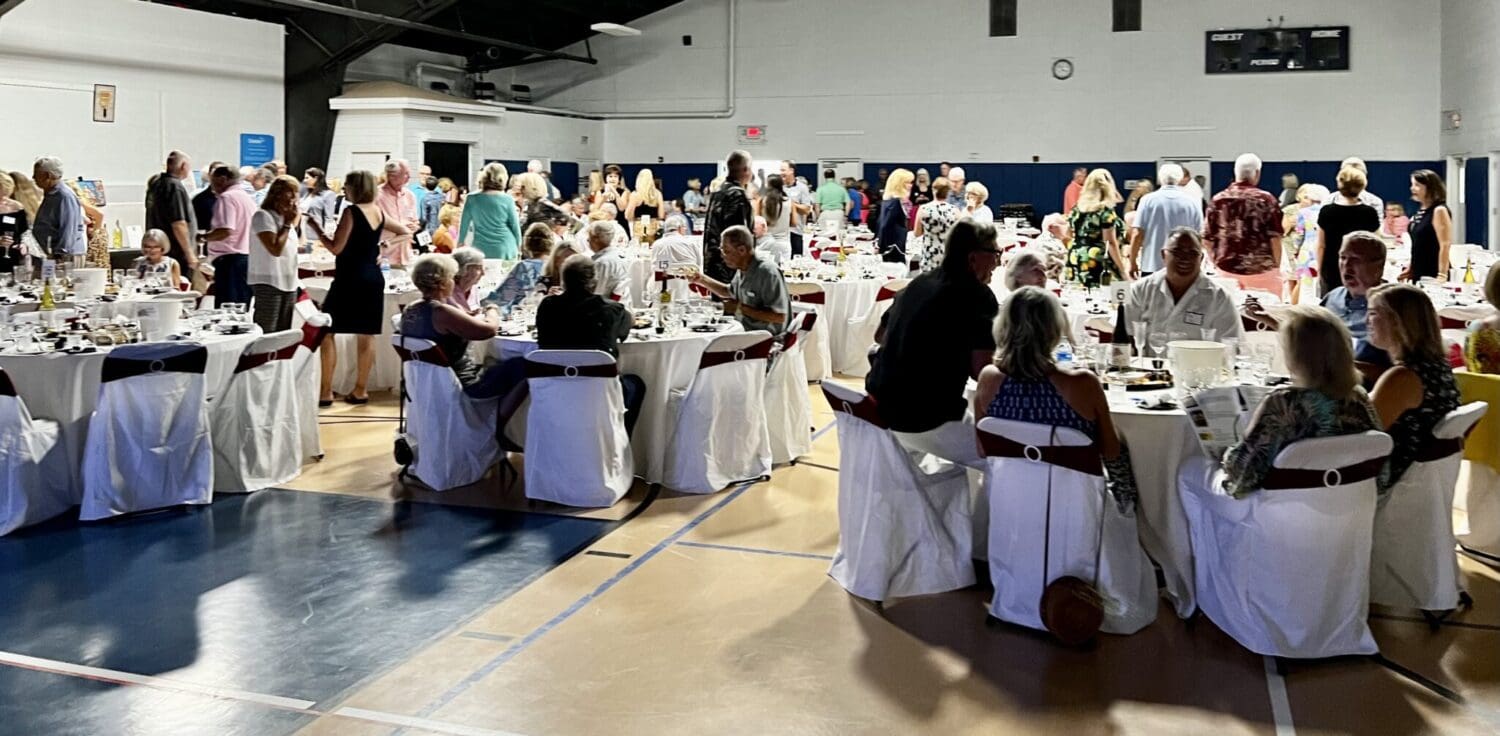 Wit, wisdom and wine shine at Center event