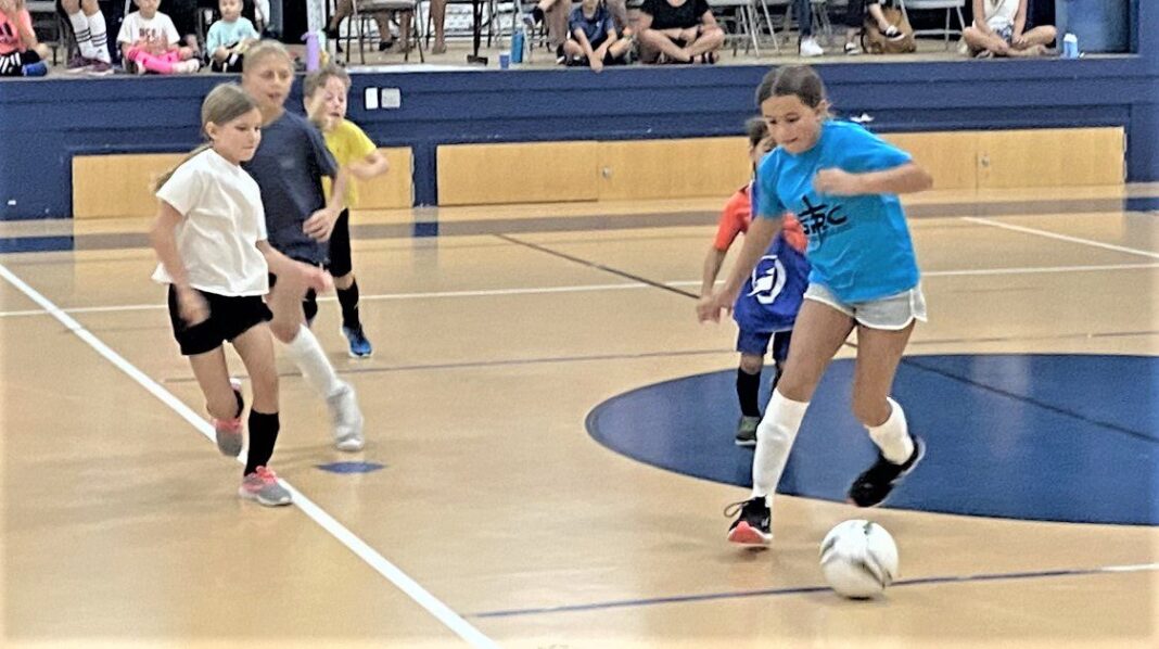 Youth beat the heat with indoor soccer