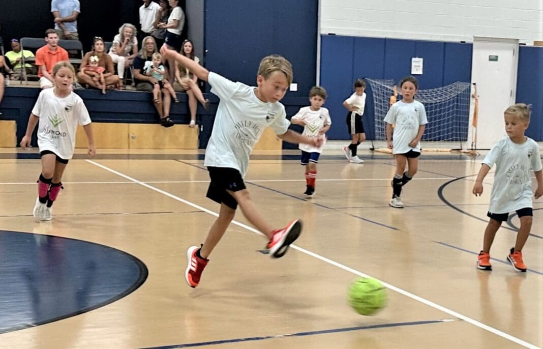 Solid Rock Construction leads youth indoor soccer leagues AMI Sun