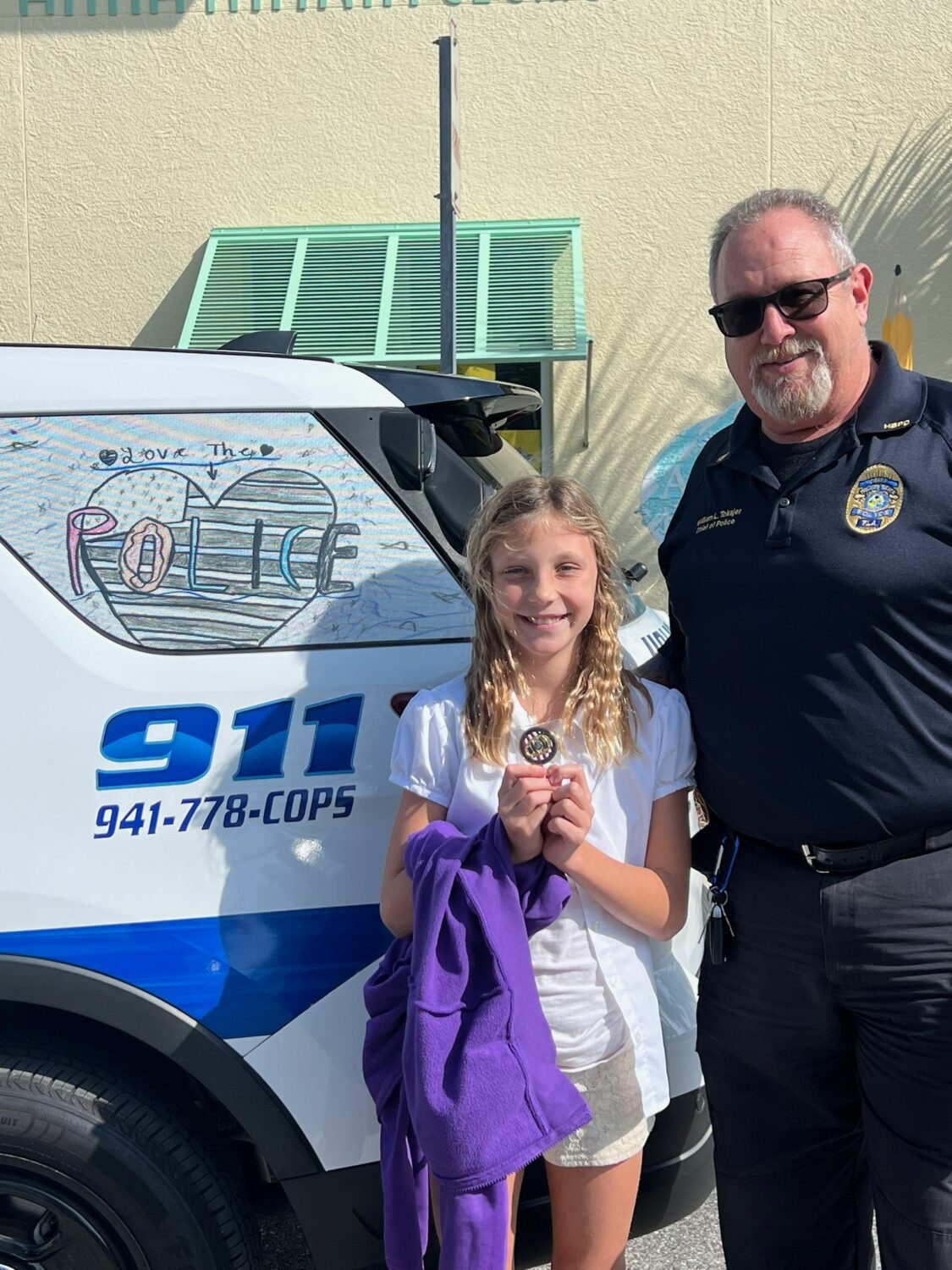AME student’s art on patrol with HBPD officer