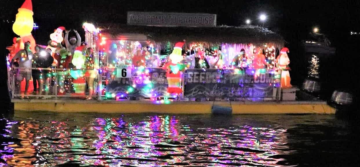 Boat parade draws merrymakers to pier AMI Sun